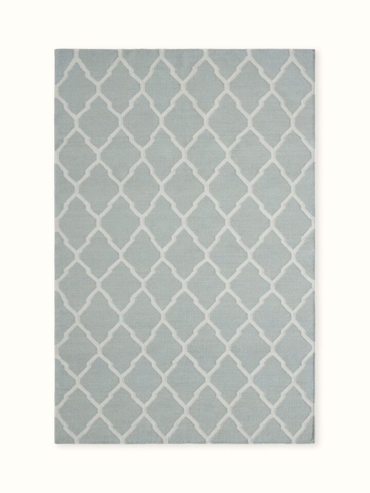 Front view showcasing the soft light aqua melange tones and geometric pattern