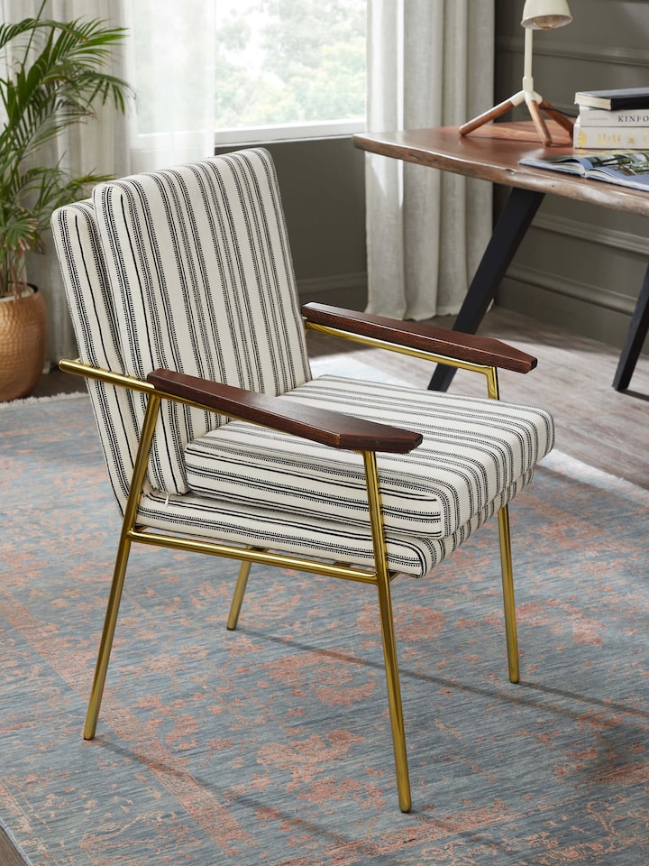 Side view of Upholstered Metal Study Chair emphasizing the ergonomic design and sleek metal frame.