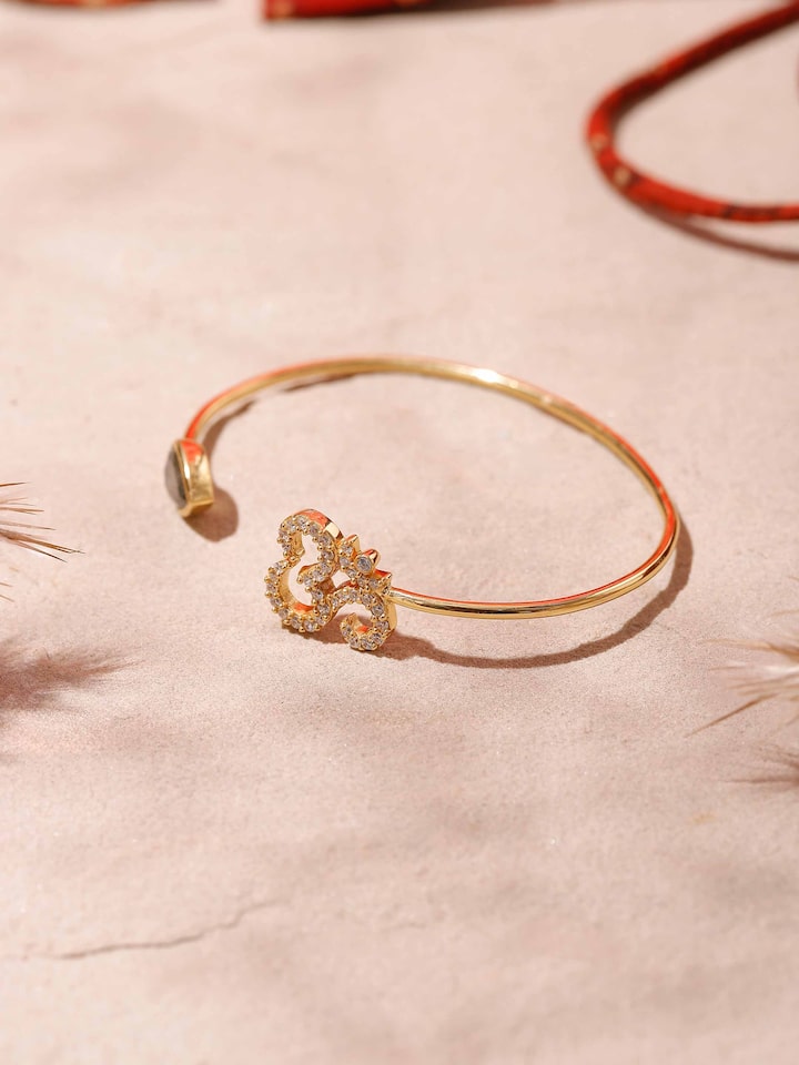 Side view of Labradorite & Om Bracelet, emphasizing the 18K gold plating and fine detailing