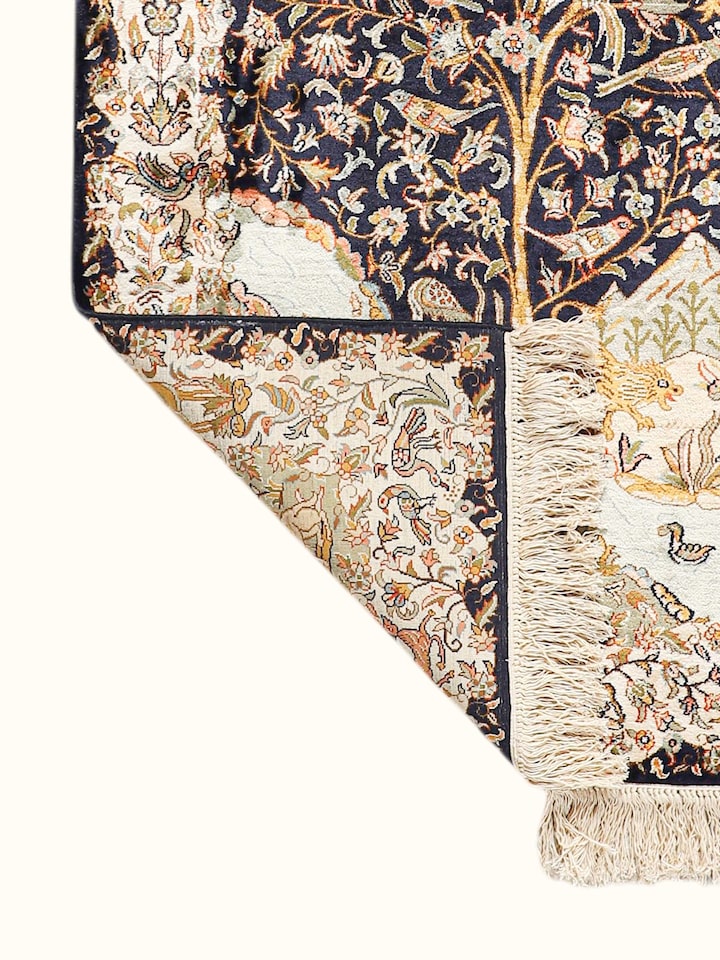 Side-angle view of the Traditional Persian Navy Rust Tree of Life Kashmir Silk Hand-Knotted Carpet