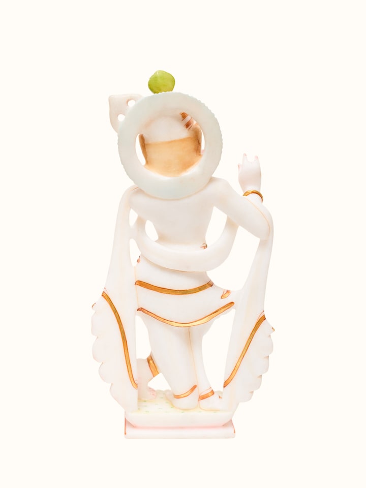 Bottom view of the Marble Carved Krishna Idol
