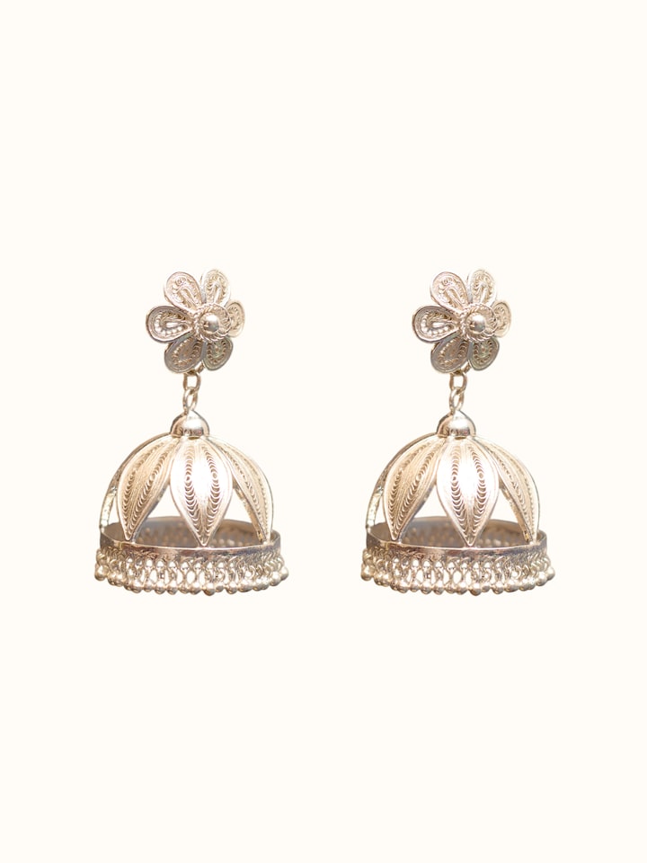 Close-up view of Silver Smithing Jhumkas highlighting the stone setting and metalwork detail