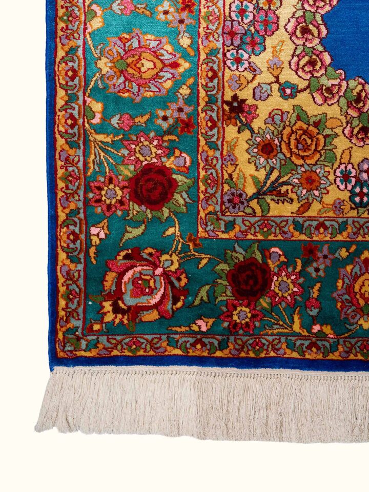 Detail view of Traditional Persian Blue Guldani Kashmir Silk Hand-Knotted Carpet highlighting the intricate pattern and pile texture