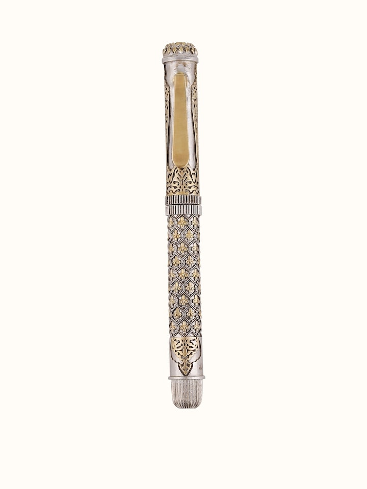 top view of silver smithing silver pen