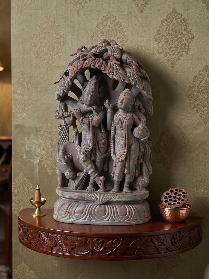Styled view of Stone Carved Radha Krishna Idol styled in a home setting