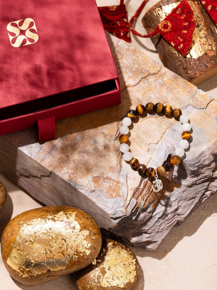 Close-up of Tiger Eye & White Moonstone Bracelet highlighting the chatoyancy of tiger eye and soft glow of moonstone