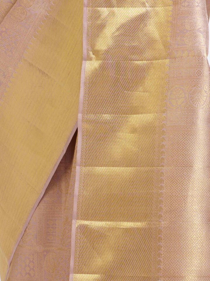 detail view of gold kancheepuram silk zari saree pattern