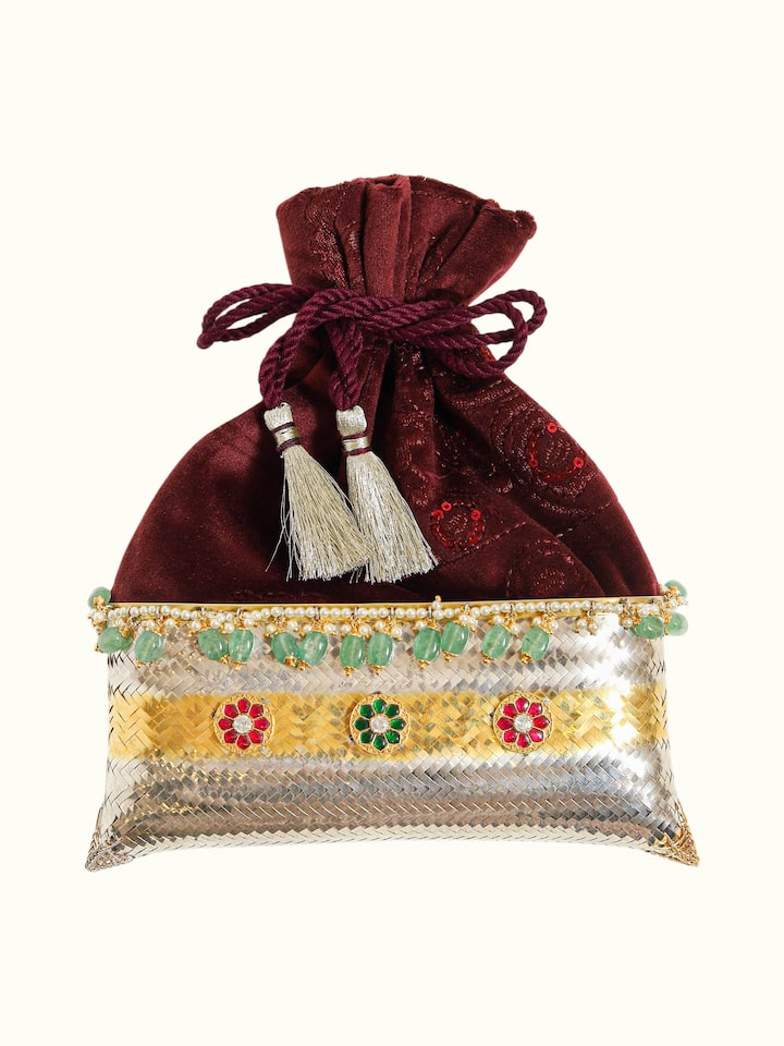 front view of silver smithing two-tone potli-style bag with decorative detailing
