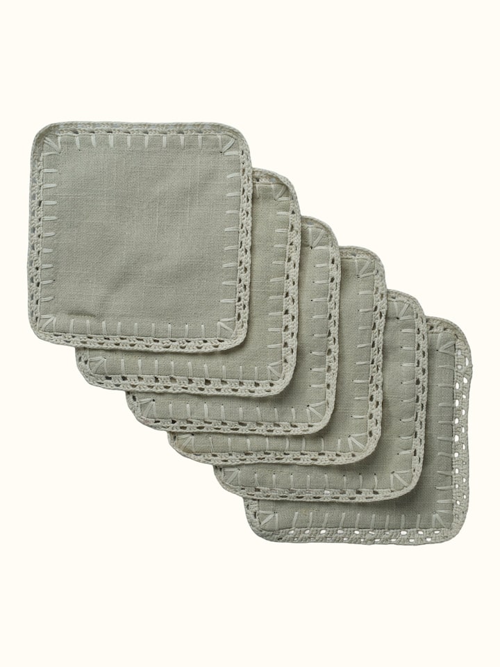 Front view of Nityam Beige Cotton Slub Crochet Coasters Set Of 6 showing the full piece and pattern